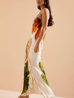 Kira | Vestido largo elegante de estilo resort con estampado floral y un hombro descubierto