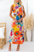 Summer | Robe longue sans manches à imprimé floral, taille cintrée et col à nouer