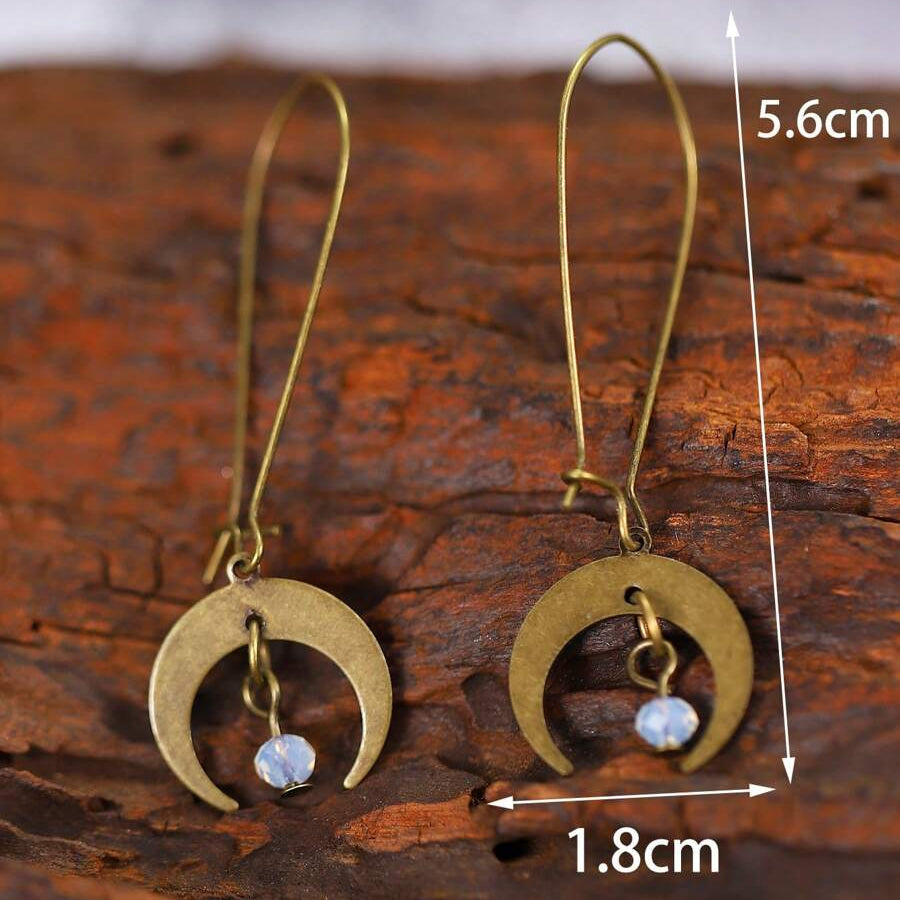 Pendientes colgantes vintage bohemios con diseño desgastado en forma de luna  