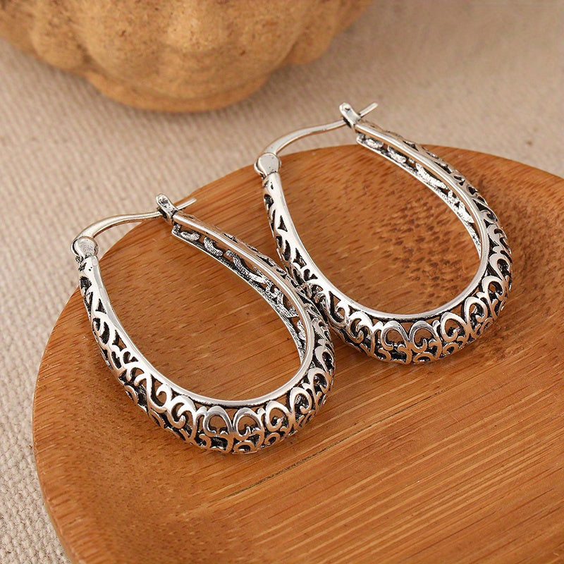 Pendientes de aro elegantes con volutas retro