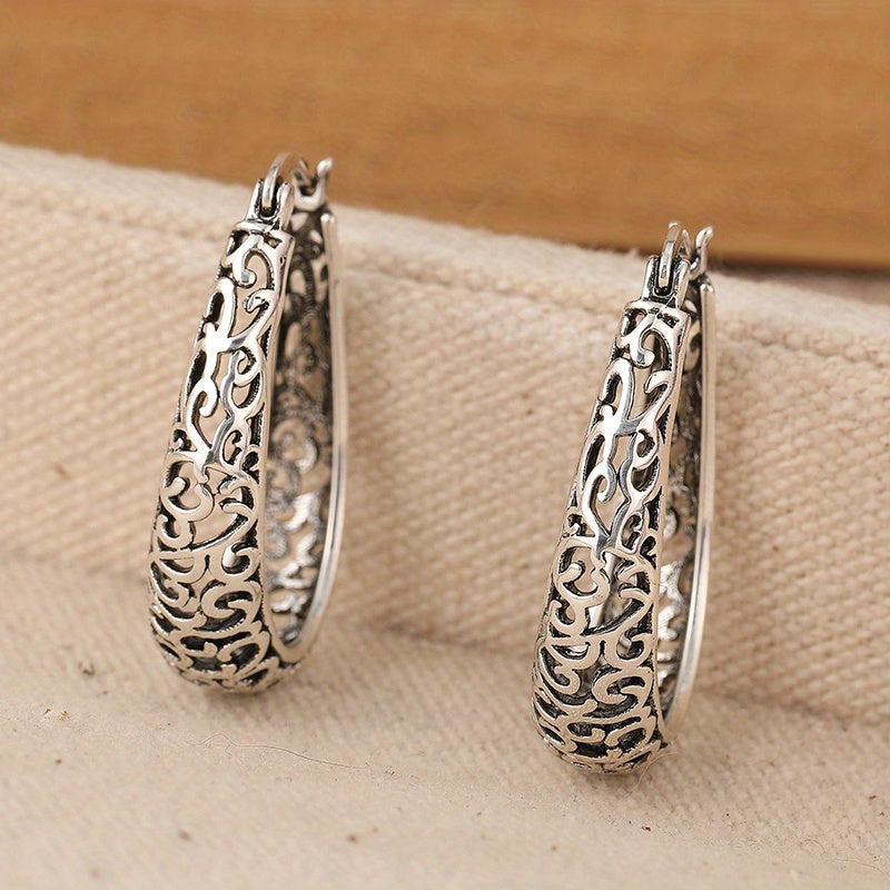 Pendientes de aro elegantes con volutas retro