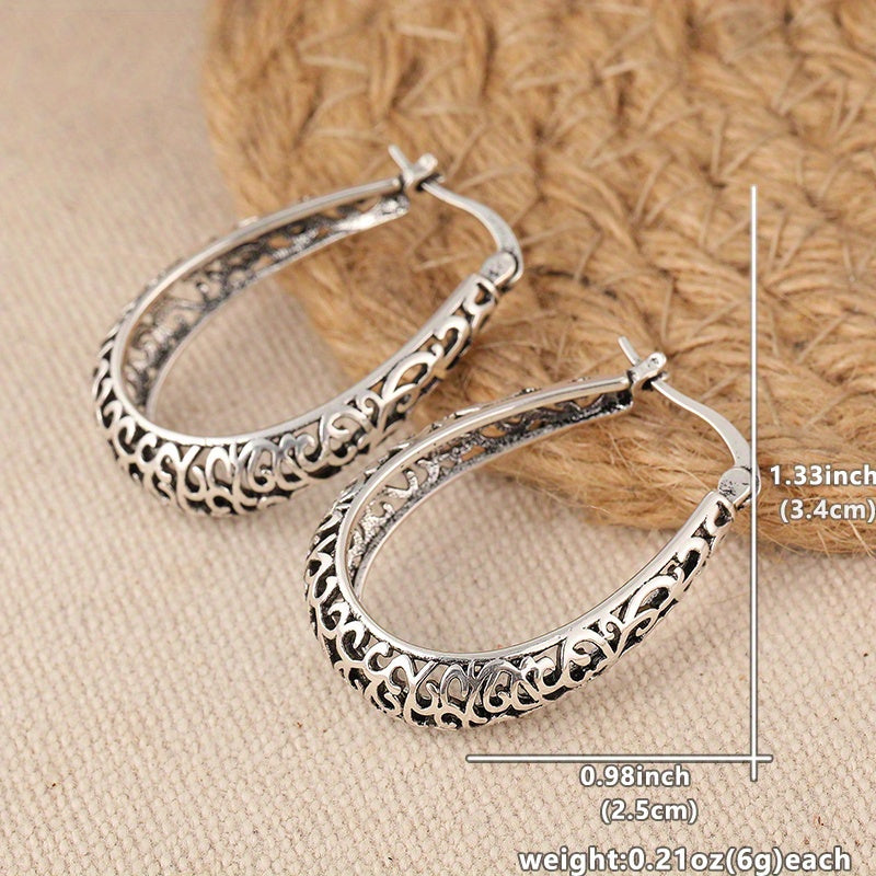 Pendientes de aro elegantes con volutas retro