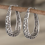 Pendientes de aro elegantes con volutas retro
