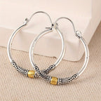 Boucles d’oreilles créoles bohèmes bicolores