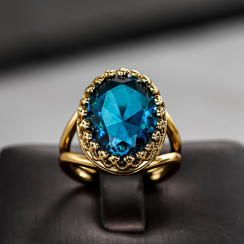 Elegant Gold Plated Oval Blue Stone Ring