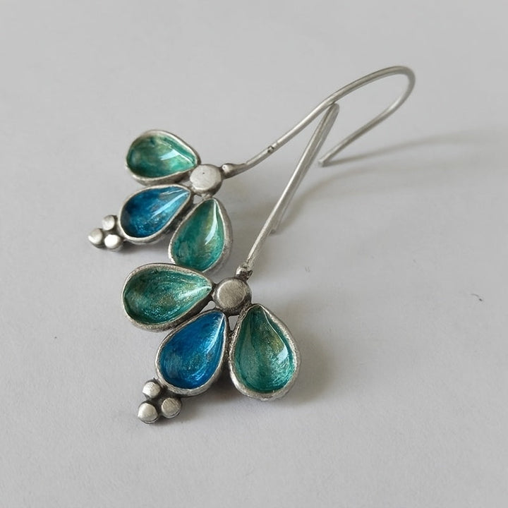 Pendientes artesanales colgantes de vidrio verde azulado con flores