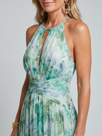 Portia | Vestido midi suave de flores, con cuello halter y corpiño plisado
