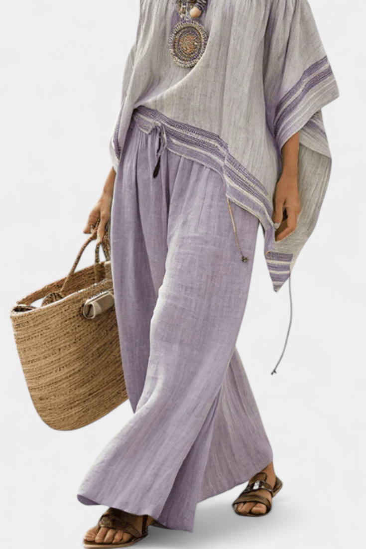 Zandrel | Haut élégant à épaules dénudées et pantalon rayé à jambes larges
