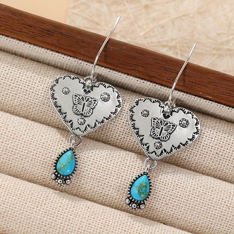 Brincos artesanais boho de prata com coração de turquesa e borboleta