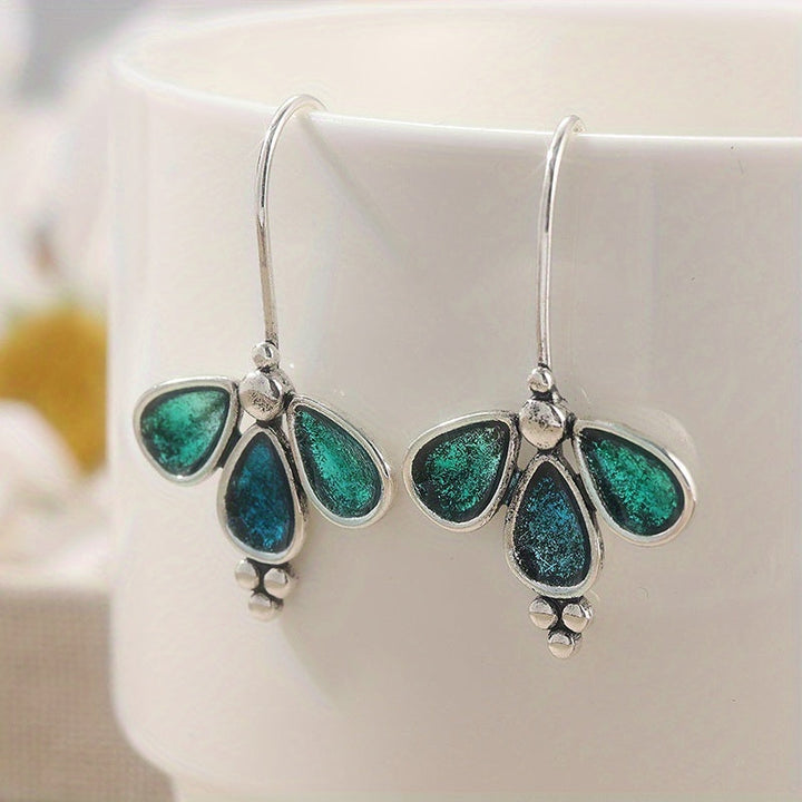Pendientes artesanales colgantes de vidrio verde azulado con flores