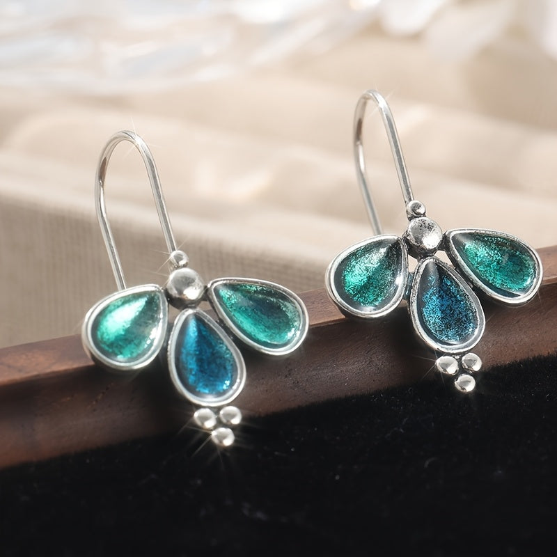 Pendientes artesanales colgantes de vidrio verde azulado con flores