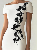 Audrey | Look com vestido midi elegante, decote canoa e estampa floral