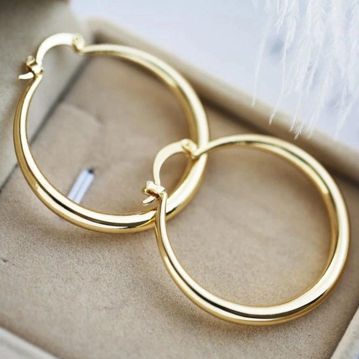 Bethany - Pendientes dorados audaces