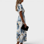 Elara | Vestido midi floral cruzado en la cintura