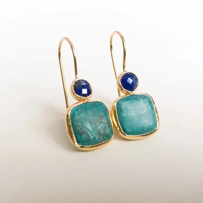 Pendientes vintage ornamentados de oro con turquesa