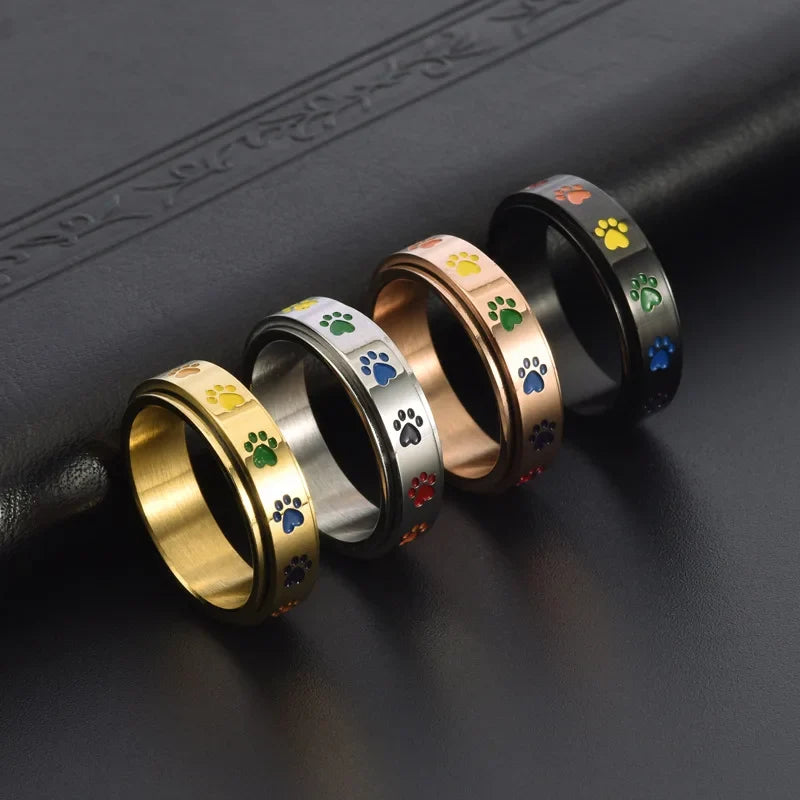Thea - Rotatable anti-stress ring with rainbow paws