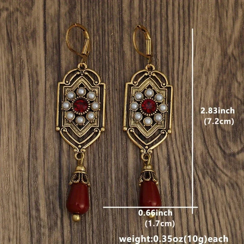 Brincos de gota art déco com granada dourada e pérolas