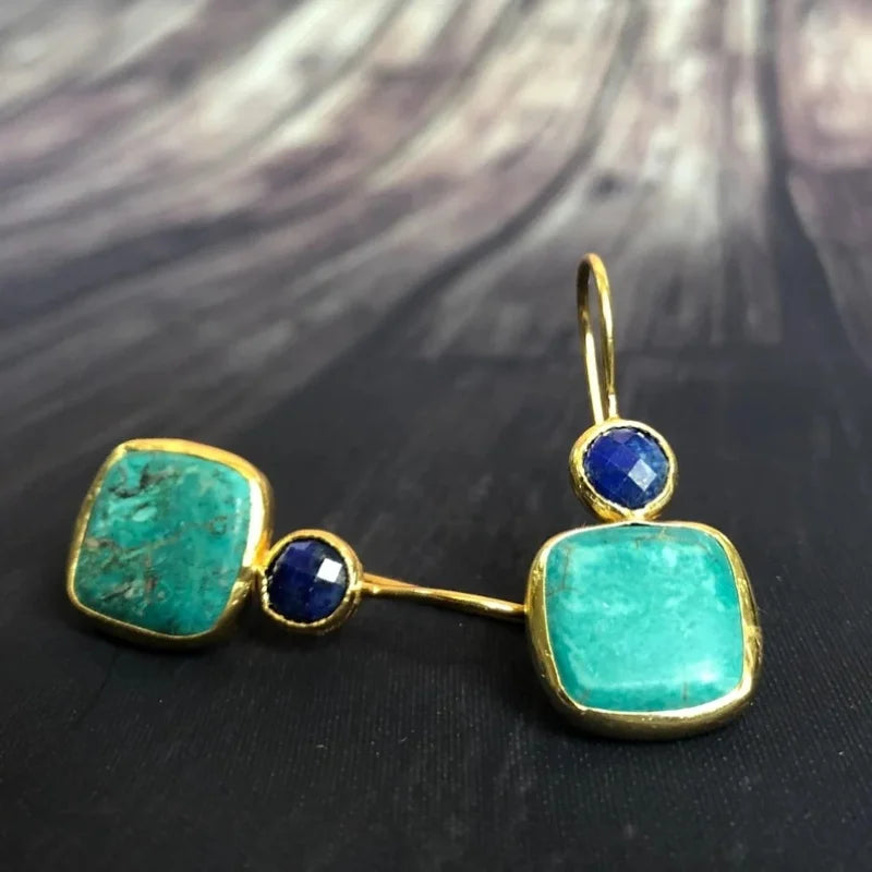 Pendientes vintage ornamentados de oro con turquesa