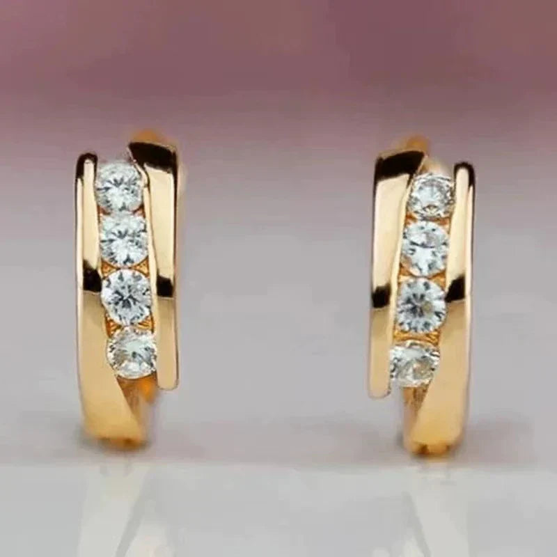 Pendientes elegantes de circonia dorada