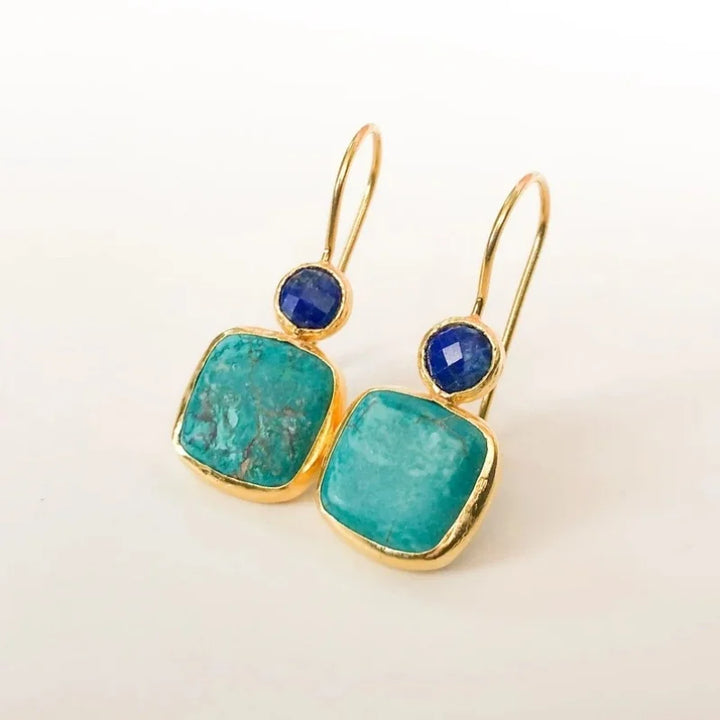 Pendientes vintage ornamentados de oro con turquesa