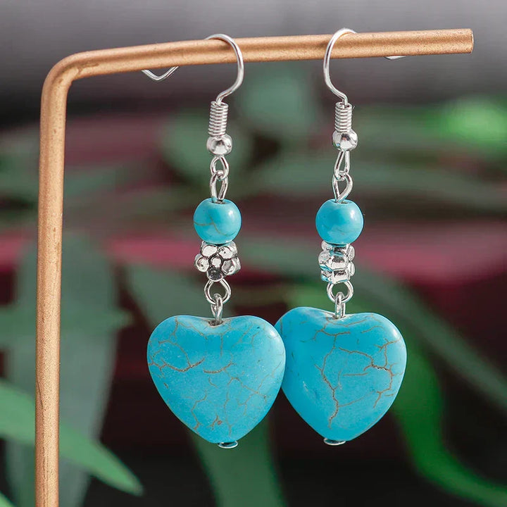 Pendientes colgantes antiguos en forma de corazón con turquesa  