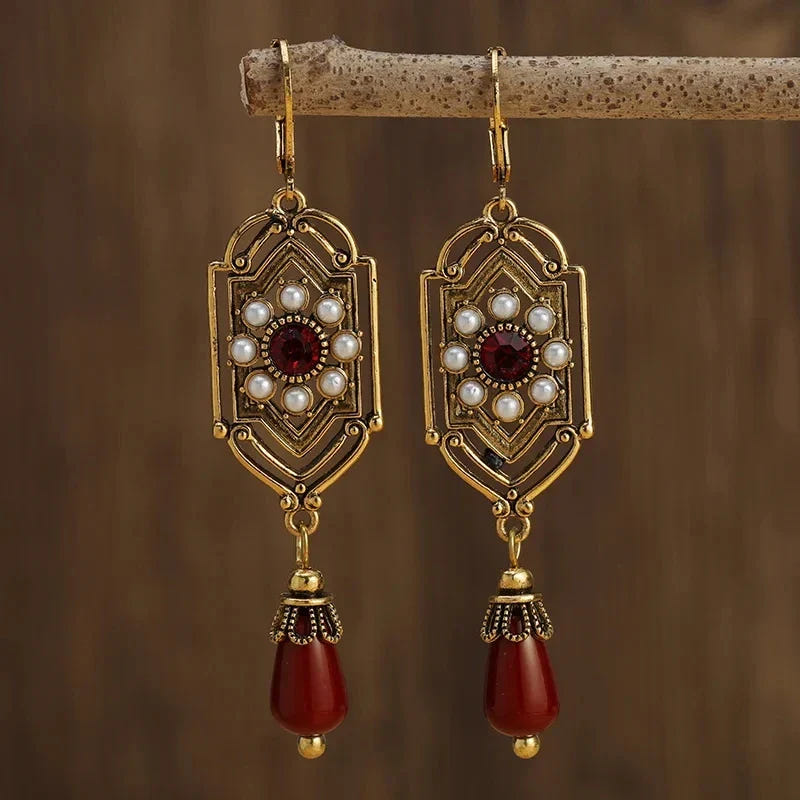 Pendientes colgantes art déco de granate dorado y perla
