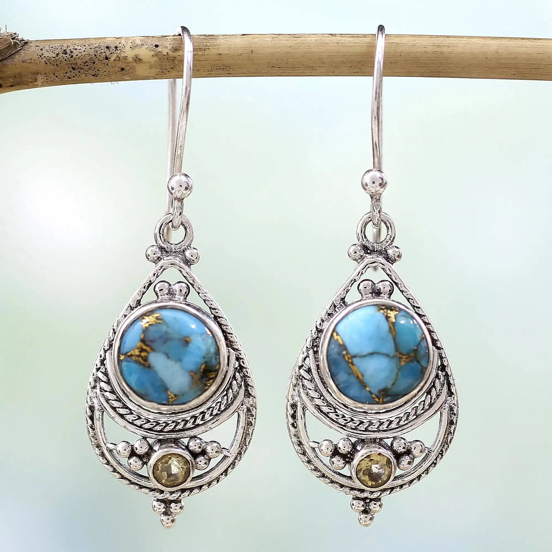 Pendientes colgantes artesanales de plata con turquesa