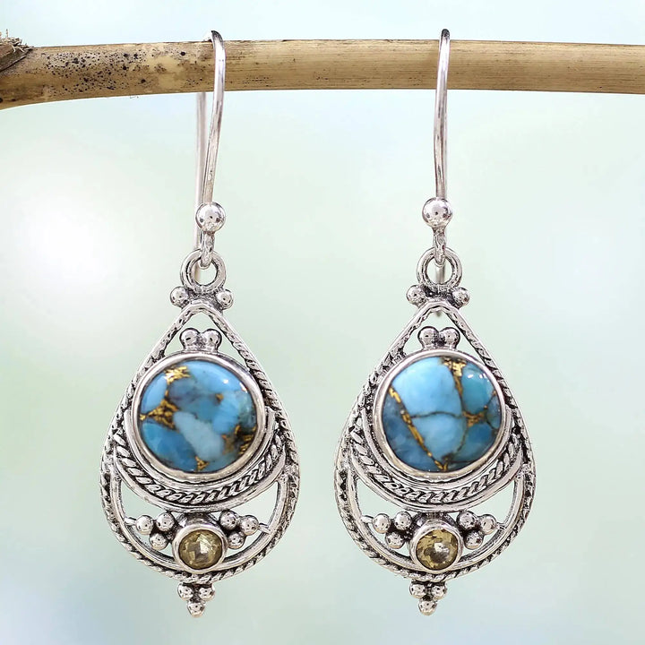 Pendientes colgantes artesanales de plata con turquesa