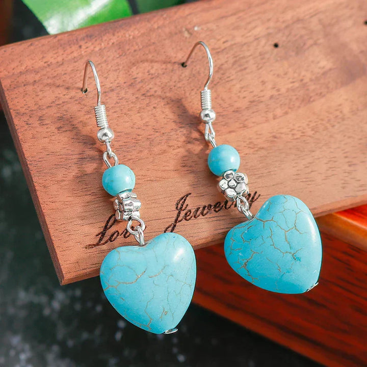 Pendientes colgantes antiguos en forma de corazón con turquesa  