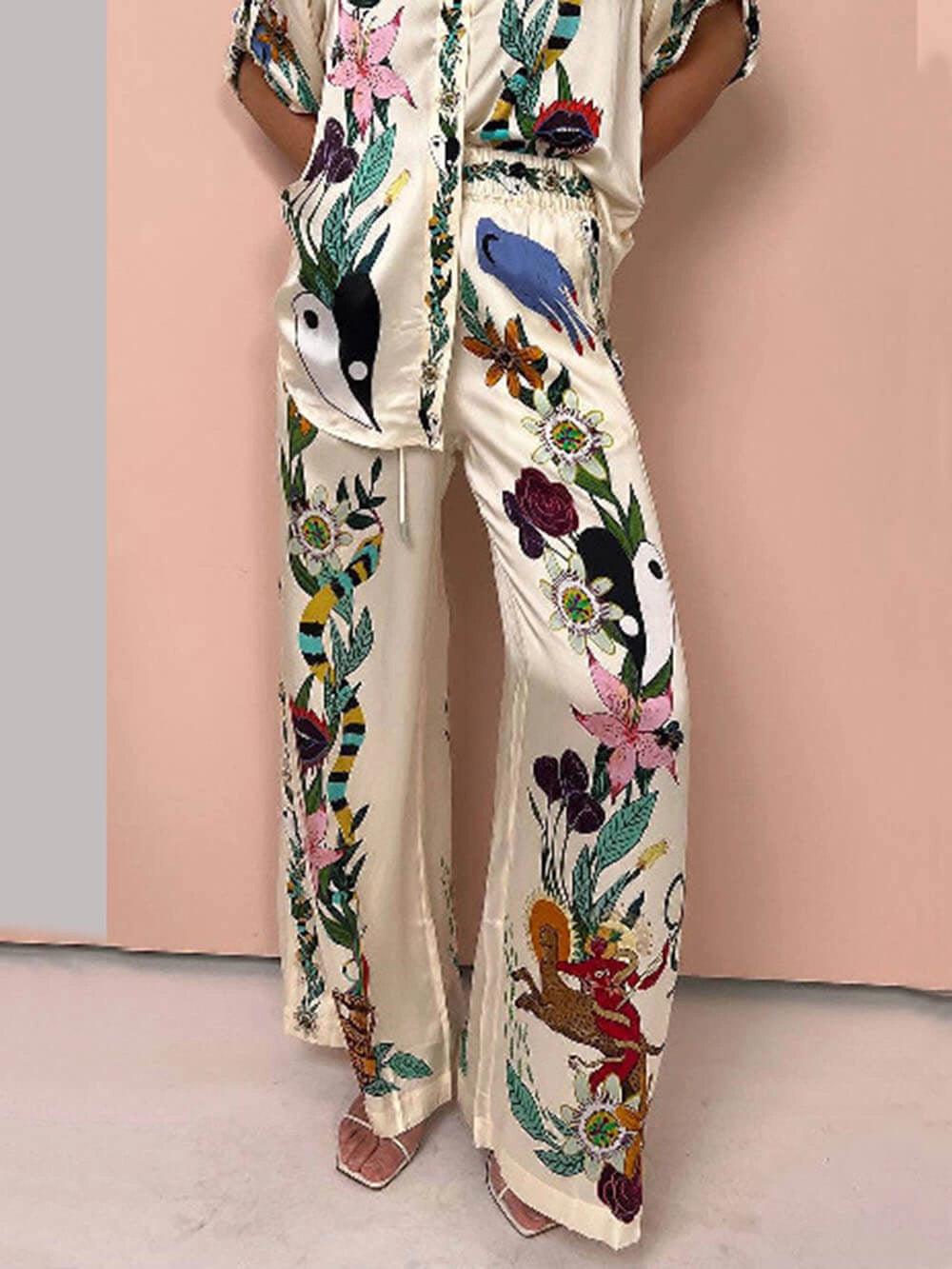 Nika | Conjunto de camisa e calça de cetim com estampa exclusiva, com estilo de resort