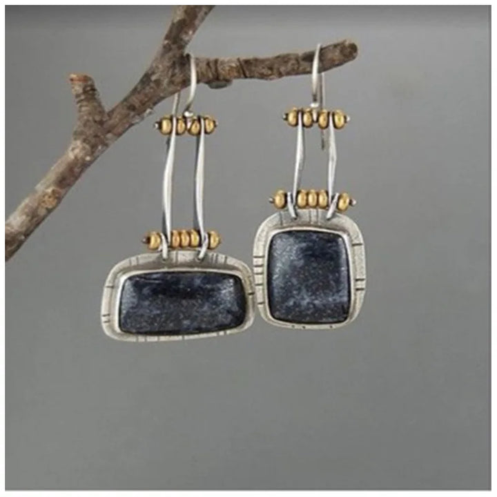 Pendientes colgantes artesanales de plata con turquesa
