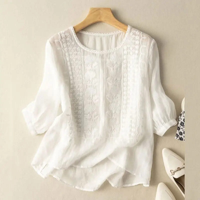 Aurora – Blouse ample brodée