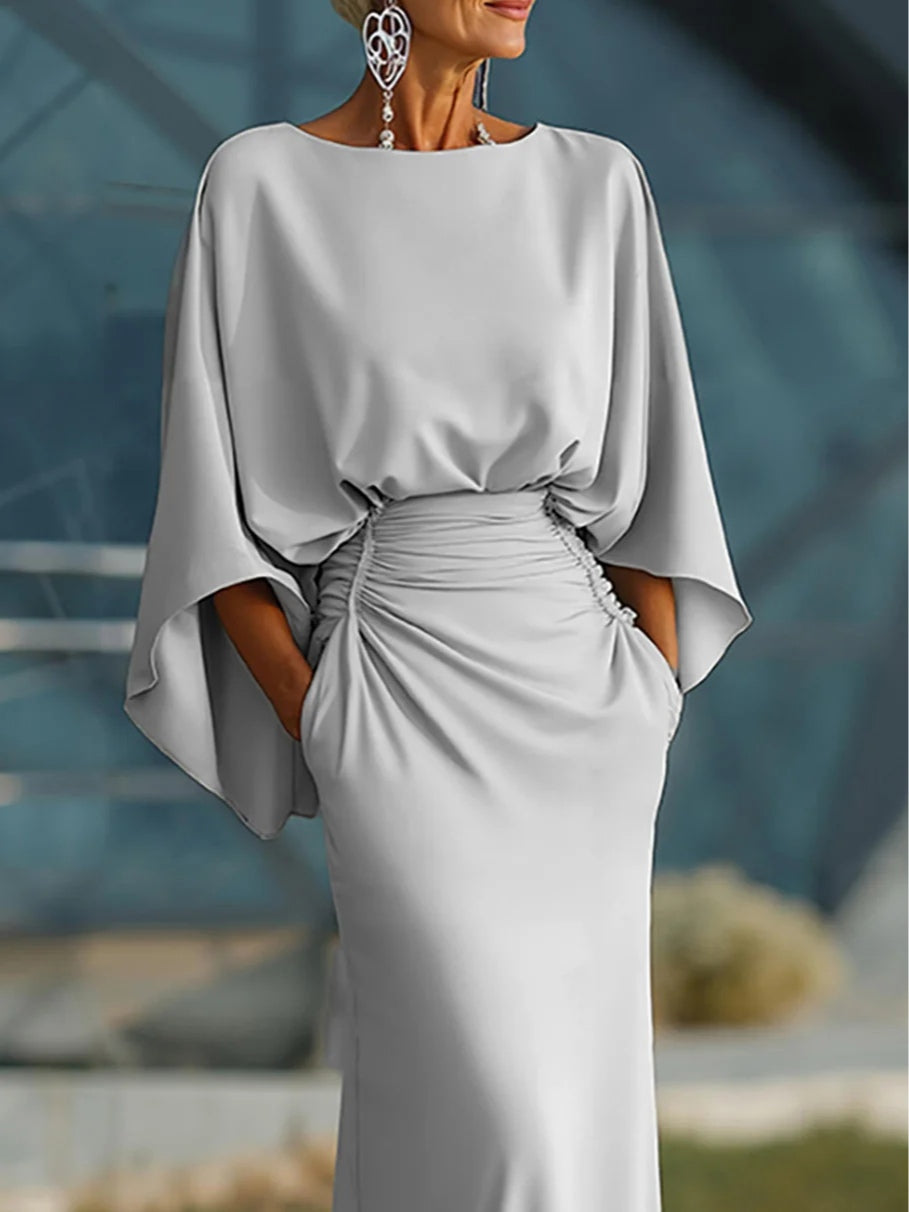 Clara | Vestido elegante sin espalda con escote en V y mangas