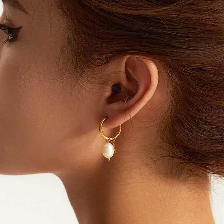 Pendientes de estrella con perla de agua dulce Silke en oro  
