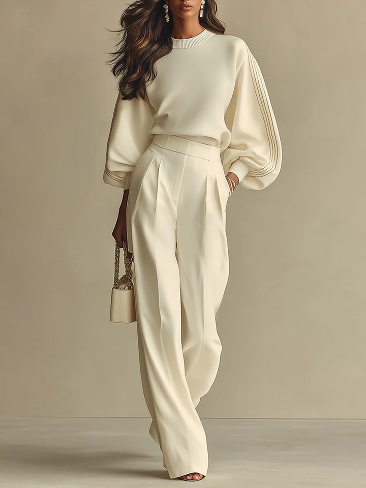 Isa| Conjunto de blusa color marfil con cuello redondo y pantalones de pierna ancha de talle alto