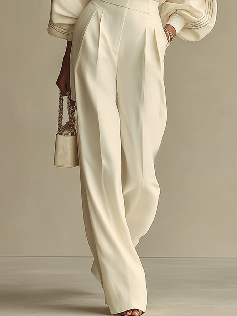 Isa| Conjunto de blusa color marfil con cuello redondo y pantalones de pierna ancha de talle alto