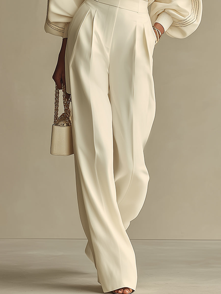 Isa| Conjunto de blusa color marfil con cuello redondo y pantalones de pierna ancha de talle alto