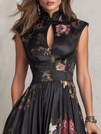 Patricia | Robe midi plissée en satin noir à fleurs
