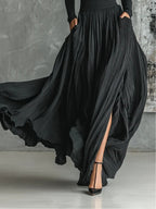 Conjunto Samantha todo preto de gola alta e saia plissada