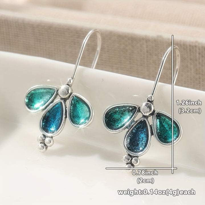 Pendientes artesanales colgantes de vidrio verde azulado con flores