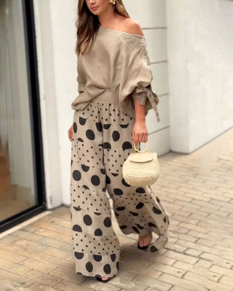 Conjunto informal de top de hombros descubiertos y pantalones estampados Samantha