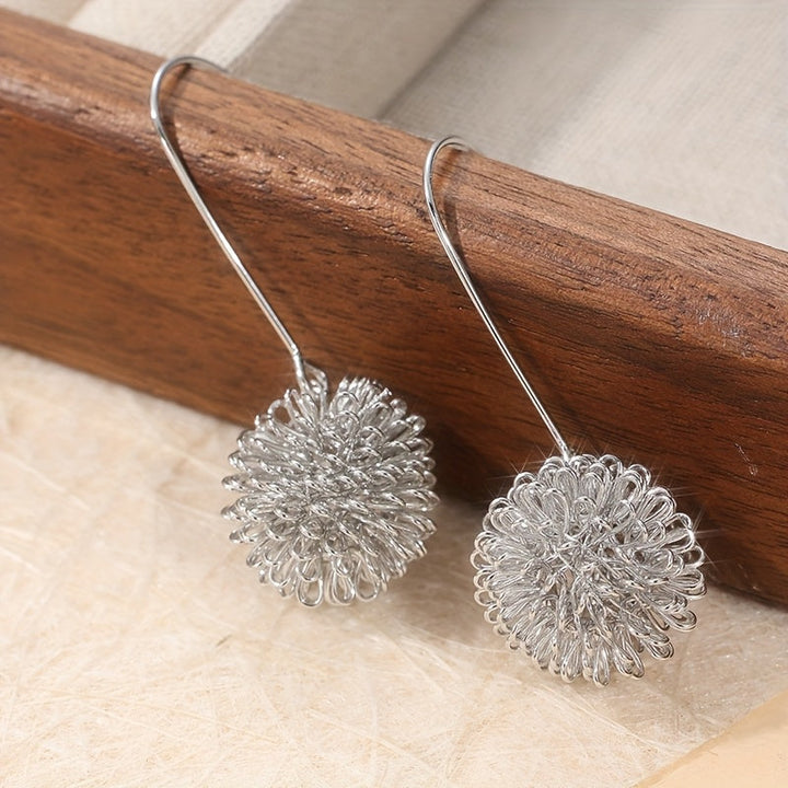 Pendientes colgantes artesanales de alambre de plata con flores