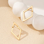 Pendientes geométricos calados chapados en oro