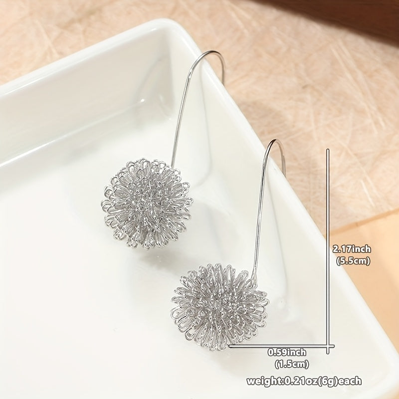 Pendientes colgantes artesanales de alambre de plata con flores