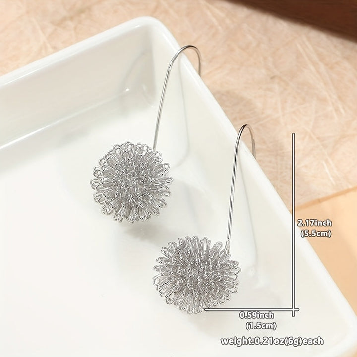 Pendientes colgantes artesanales de alambre de plata con flores