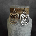 Pendientes vintage de espiral plateada