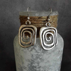 Pendientes vintage de espiral plateada
