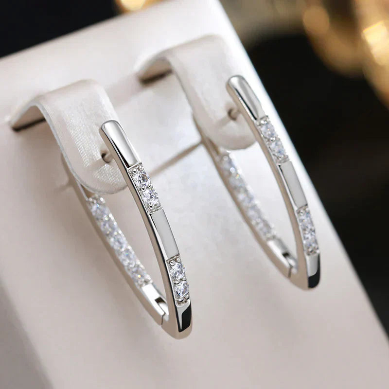 Pendientes elegantes de circonia en oro