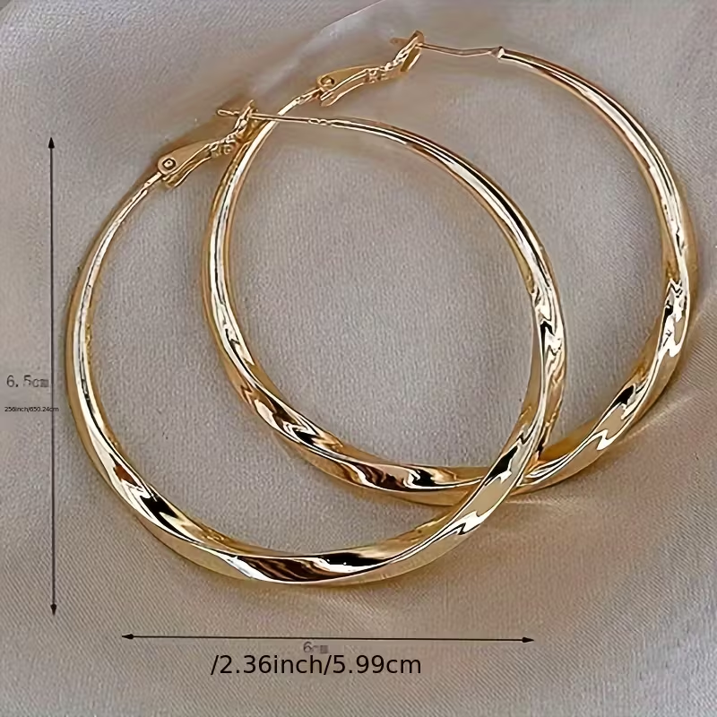 Pendientes grandes de aro dorados y elegantes