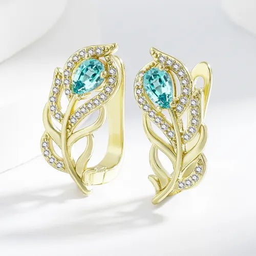 Pendientes bohemios de diseño dorado con hoja de turquesa